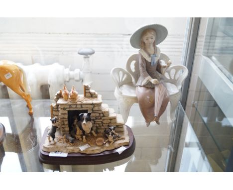 A Border Fine Arts 'Jocks Pride' depicting dogs in a fireplace together with a Lladro model of a girl seated on a bench with 