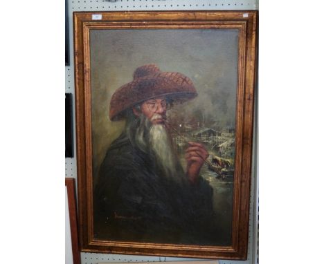 A 20th Century Chinese School oil painting depicting a man smoking an opium pipe.