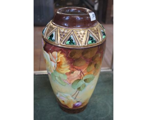 Alexandra Porcelain Works hand painted ceramic vase decorated with flowers.