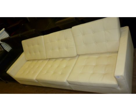 A good quality modern Knoll style cream leather three seater sofa.