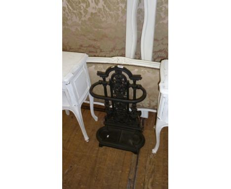 A Victorian style cast iron stick stand, having pierced decoration.