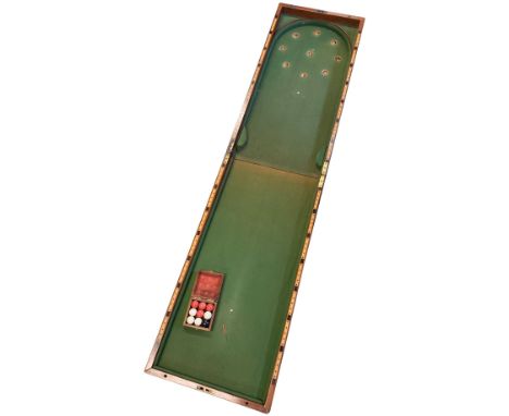 An antique mahogany folding "Bagatelle" board in original condition - baize covered base. box and ebony detailed scoring poin