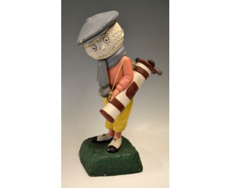 Dunlop Caddy  papier-mâché golf ball advertising figure - mounted on naturalistic splayed base complete with all 6 golf clubs