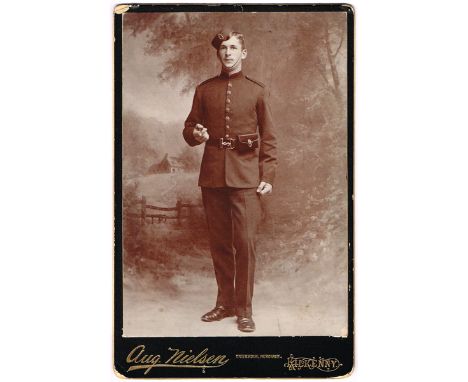 Royal Irish Constabulary, photographs. A Carte de Cabinet studio portrait of an RIC constable, labelled 'Alexander Maxwell RI