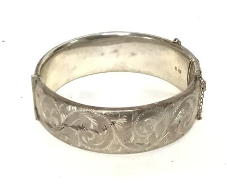 A heavy silver bangle , London hallmarked