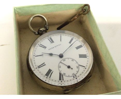 A .800 silver cased Sans Rival pocket watch , with key. Postage cat B