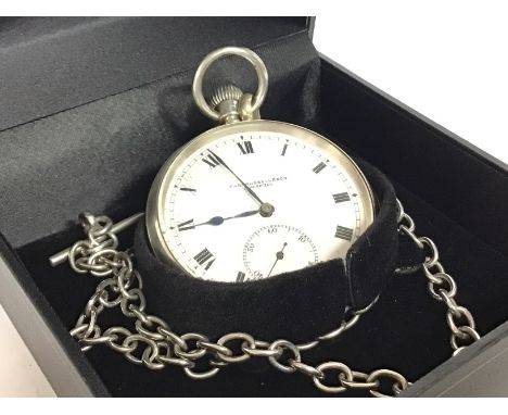 A silver button wind Thomas Russel & Son Liverpool pocket watch and chain , postage category B