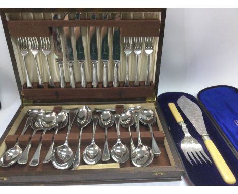 A canteen of cutlery and a cased pair of Mappin & Webb silver plated fish servers (2). Shipping category B.