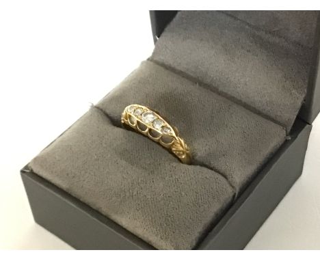 A 5 stone diamond 18ct gold ring, size K, 1.9g. Postage category A