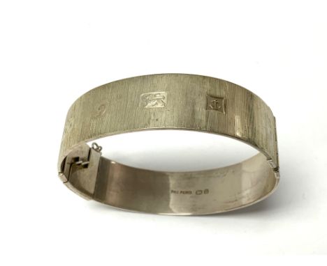 A modern Hallmarked silver bangle. (A)