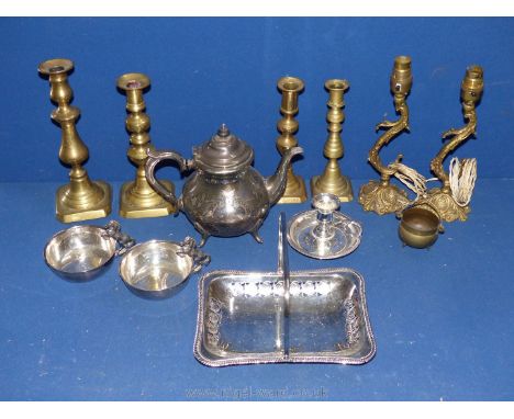 A quantity of metalware including teapot, candlesticks, bowl with horse shaped handle, etc.