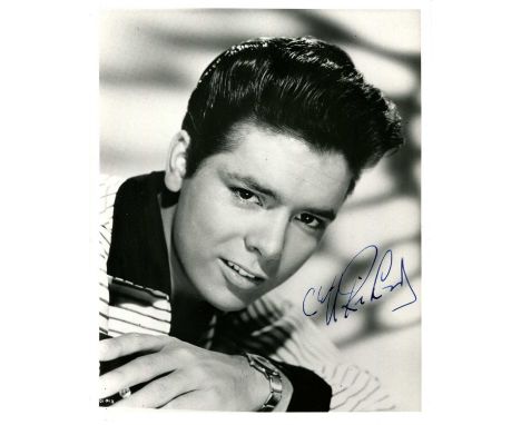 RICHARD CLIFF: (1940- ) British singer and actor. Signed 8 x 10 photograph of the handsome young singer in a close-up head an