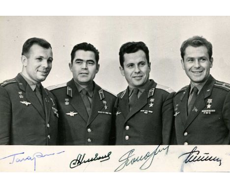 RUSSIAN COSMONAUTS: A good multiple signed 6 x 4 photograph by the first four Russian cosmonauts to make spaceflights, compri