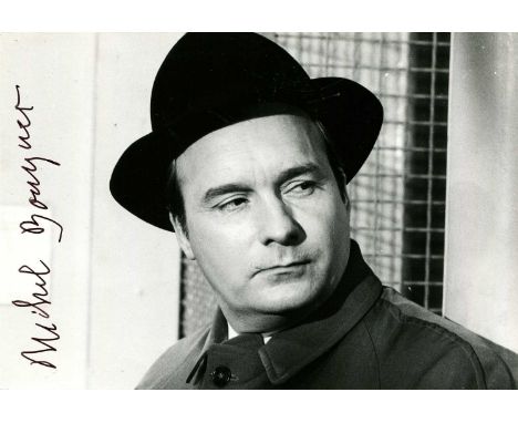 BOUQUET MICHEL: (1925-2022) French actor. Signed 7 x 4.5 photograph of Bouquet in a head and shoulders pose wearing a black h