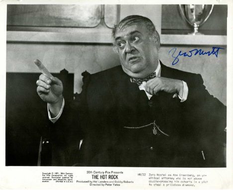 MOSTEL ZERO: (1915-1977) American actor. Signed 10 x 8 photograph of Mostel seated in a half-length pose in costume as the at
