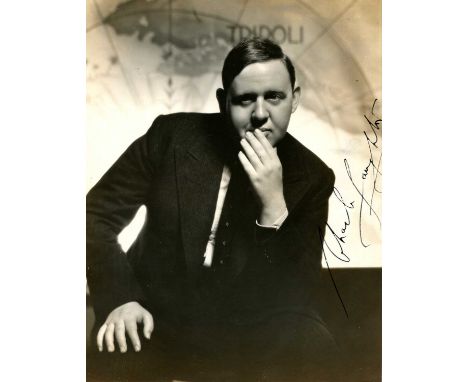 LAUGHTON CHARLES: (1899-1962) English actor, Academy Award winner. Vintage signed 7 x 9 photograph of the young actor seated 