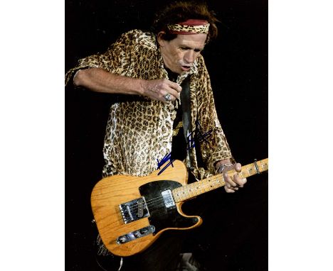 RICHARDS KEITH: (1943- ) English musician and songwriter, a co-founder of the Rolling Stones. Signed colour 8 x 10.5 photogra