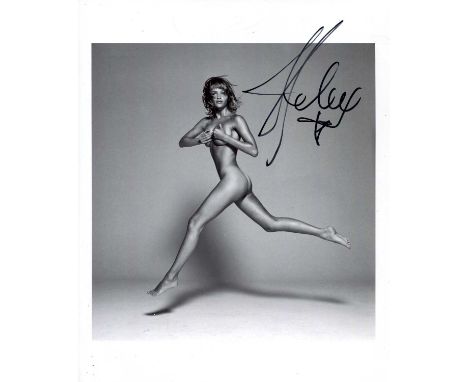 CHRISTENSEN HELENA: (1968- ) Danish supermodel. Signed 8 x 10 photograph of Christensen in a full-length naked pose, leaping 