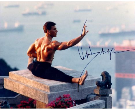 VAN DAMME JEAN-CLAUDE: (1960- ) Belgian actor and martial artist. Signed colour 10 x 8 photograph of the actor seated in a fu