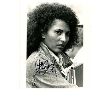 GRIER PAM: (1949- ) American actress. Signed 8 x 10 photograph of Grier in a head and shoulders pose wearing a denim jacket a