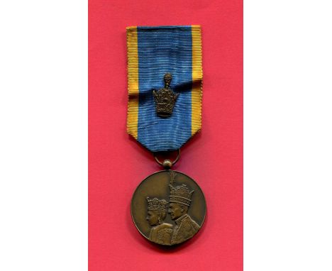 [PAHLAVI MOHAMMAD REZA]: (1919-1980) Shah of the Imperial State of Iran 1941-79. A bronze Coronation medal of the last Shah o