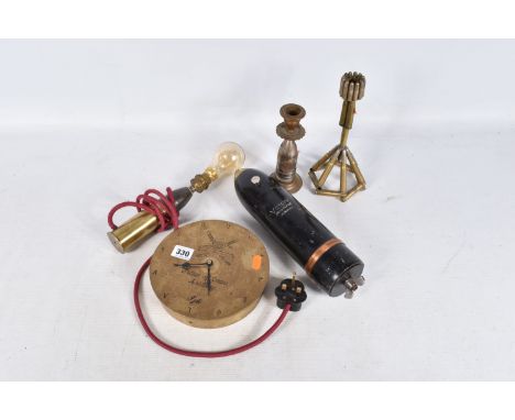 FIVE ASSORTED TRENCH ART PIECES, to include two candlesticks, clock and two lamps, the candlesticks are not matching and are 
