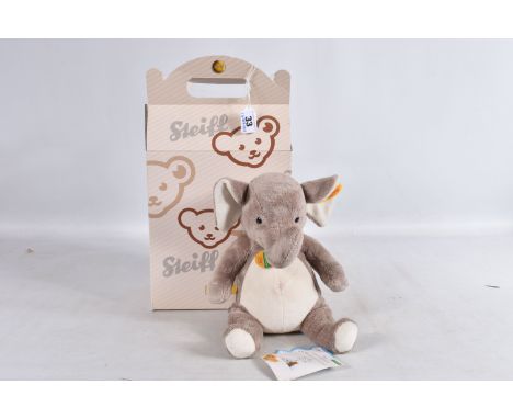 A BOXED STEIFF ORIGINAL COSY FRIENDS ELEPHANT, No.110429, soft plush figure with button (minor wear) and yellow tag to left e