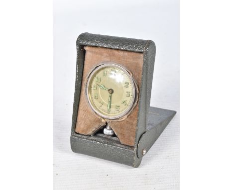 A CASED FOLDING TRAVEL CLOCK, silvered dial with luminescent Arabic numerals with the full 24 hour markers featured at each p