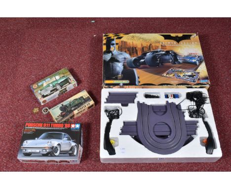 A BOXED MICRO SCALEXTRIC BATMAN BEGINS SLOT RACING SET, No.G1026, appears complete and in good condition with both cars, trac