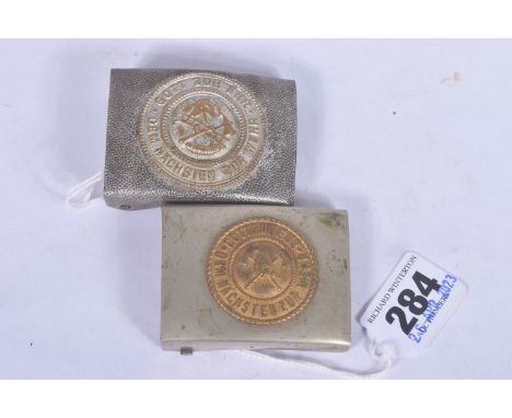 TWO GERMAN FIRE SERVICE BELT BUCKLES, both feature the motto ' GOTT ZUR EHR DEM NACHSTEN ZUR WEHR' one has crossed axes and t