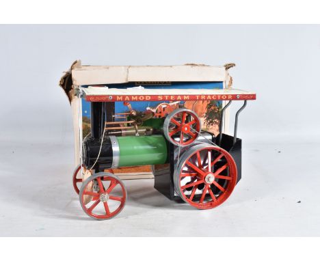 A BOXED MAMOD STEAM TRACTION ENGINE, No.T.E.1a, green body with red, black, cream and bare metal detail, worn to the top, and