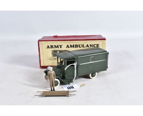 A BOXED BRITAINS R.A.M.C. ARMY AMBULANCE, No.1512, version with square front, Cross decals have been removed, missing driver 