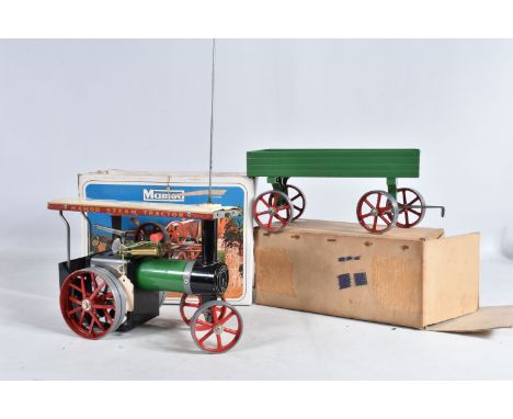 A BOXED MAMOD STEAM TRACTION ENGINE, No.T.E.1a, green body with red, black, cream and bare metal detail, some loss to the pai