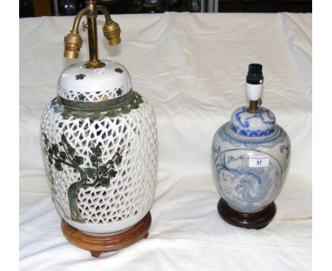 A decorative oriental table lamp and one other