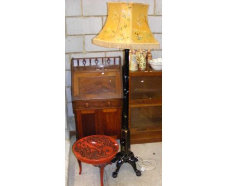 A Chinese lacquered standard lamp with shade, together with an oriental occasional table