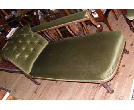 An Edwardian rosewood framed button back chaise longue