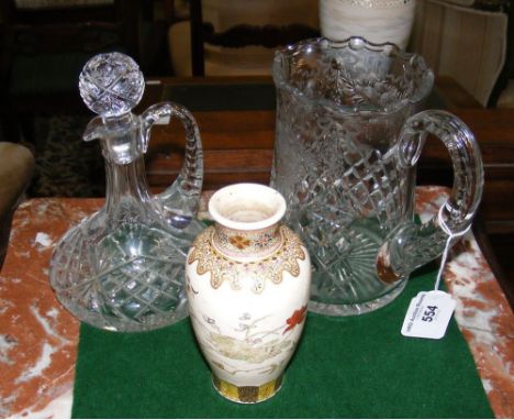 A cut glass jug, decanter and oriental vase