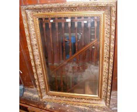 A large gilt framed wall mirror - 120cm x 88cm