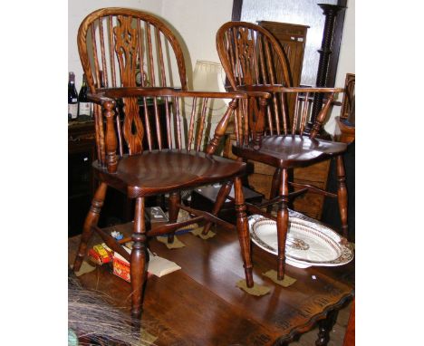 A pair of country stick back armchairs