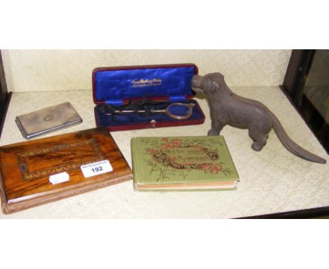 Various collectables, including lorgnettes, nutcracker