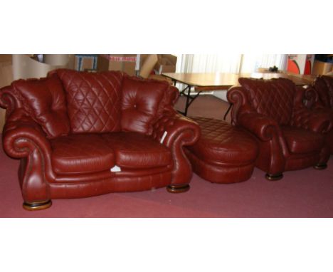 The matching two seater settee, armchair and pouffe