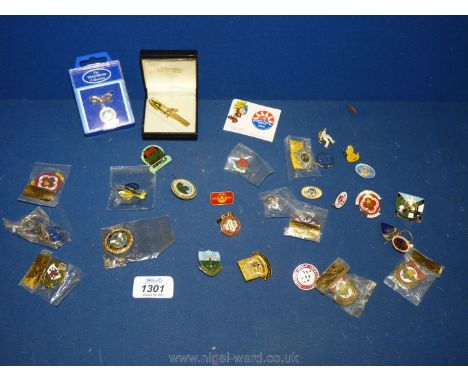 A quantity of enamel badges, mostly related to bowling.