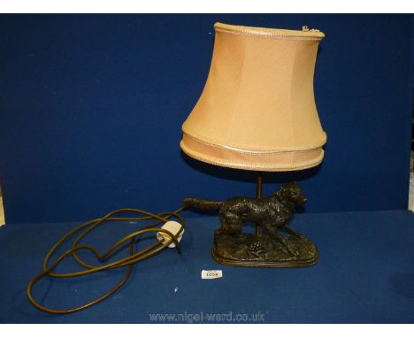 A cast metal table Lamp in the form of a gun dog, 17'' tall including shade x 10'' long.