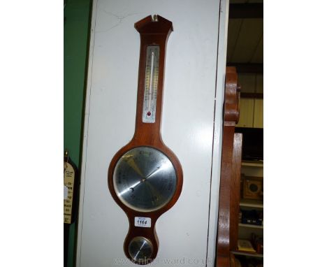 A Mahogany framed Aneroid Banjo Barometer/Thermometer/ Hydrometer by ''Moco, England'', 22 1/2'' long approx.
