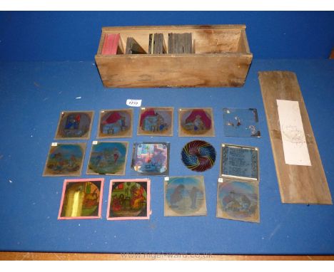 A quantity of Victorian magic lantern slides of various children's stories including a full set of twelve of 'The Oiled Feath