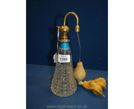A cut glass scent atomizer with silver and blue enamel mount, 10" tall.