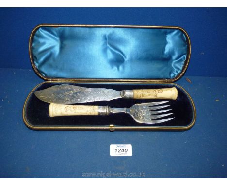 A pair of fish servers in Japanese style having bone handles with Japanese figures, "Casio" engraved on the handles and W.B &