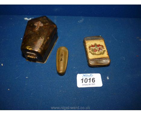 A brass coffin shaped trinket box and Vesta case together with a celluloid vesta for Douglas, Isle of Man.