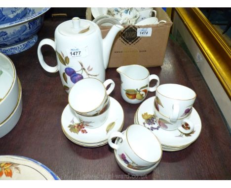 A Royal Worcester Evesham china coffee service with coffee pot, milk jug, sugar bowl, six saucers and five coffee cups.