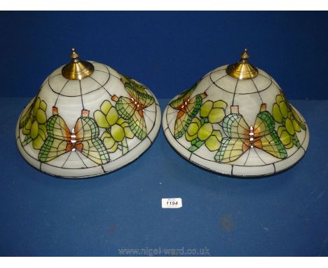 A pair of Tiffany style lamp-shades decorated with Butterflies, 14'' diameter.